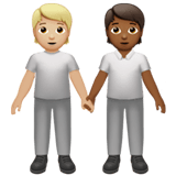 🧑🏼‍🤝‍🧑🏾 People Holding Hands: Medium-Light Skin Tone, Medium-Dark Skin Tone, Emoji by Apple