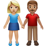 👩🏼‍🤝‍👨🏽 Woman and Man Holding Hands: Medium-Light Skin Tone, Medium Skin Tone, Emoji by Apple