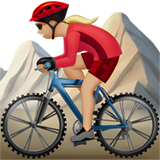 🚵🏼‍♀️ Woman Mountain Biking: Medium-Light Skin Tone, Emoji by Apple