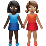 👩🏿‍🤝‍👩🏽 Women Holding Hands: Dark Skin Tone, Medium Skin Tone, Emoji by Apple