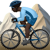 🚵🏿‍♂️ Мужчина на Горном Велосипеде: Очень Темный Тон Кожи, смайлик от Apple