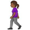 🚶🏾‍♀️ Woman Walking: Medium-Dark Skin Tone, Emoji by Samsung