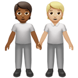 🧑🏾‍🤝‍🧑🏼 People Holding Hands: Medium-Dark Skin Tone, Medium-Light Skin Tone, Emoji by Apple