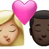 👩🏼‍❤️‍💋‍👨🏿 Kiss: Woman, Man, Medium-Light Skin Tone, Dark Skin Tone, Emoji by Apple