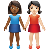 👩🏾‍🤝‍👩🏻 Women Holding Hands: Medium-Dark Skin Tone, Light Skin Tone, Emoji by Apple