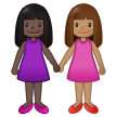 👩🏿‍🤝‍👩🏽 Women Holding Hands: Dark Skin Tone, Medium Skin Tone, Emoji by Samsung