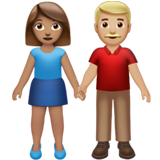 👩🏽‍🤝‍👨🏼 Woman and Man Holding Hands: Medium Skin Tone, Medium-Light Skin Tone, Emoji by Apple